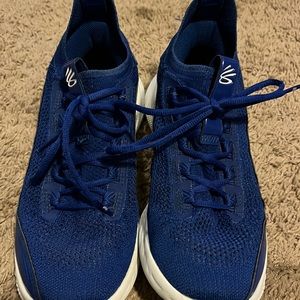 Used one basketball season. Under Armour, navy Curry’s. Men’s size 8.5